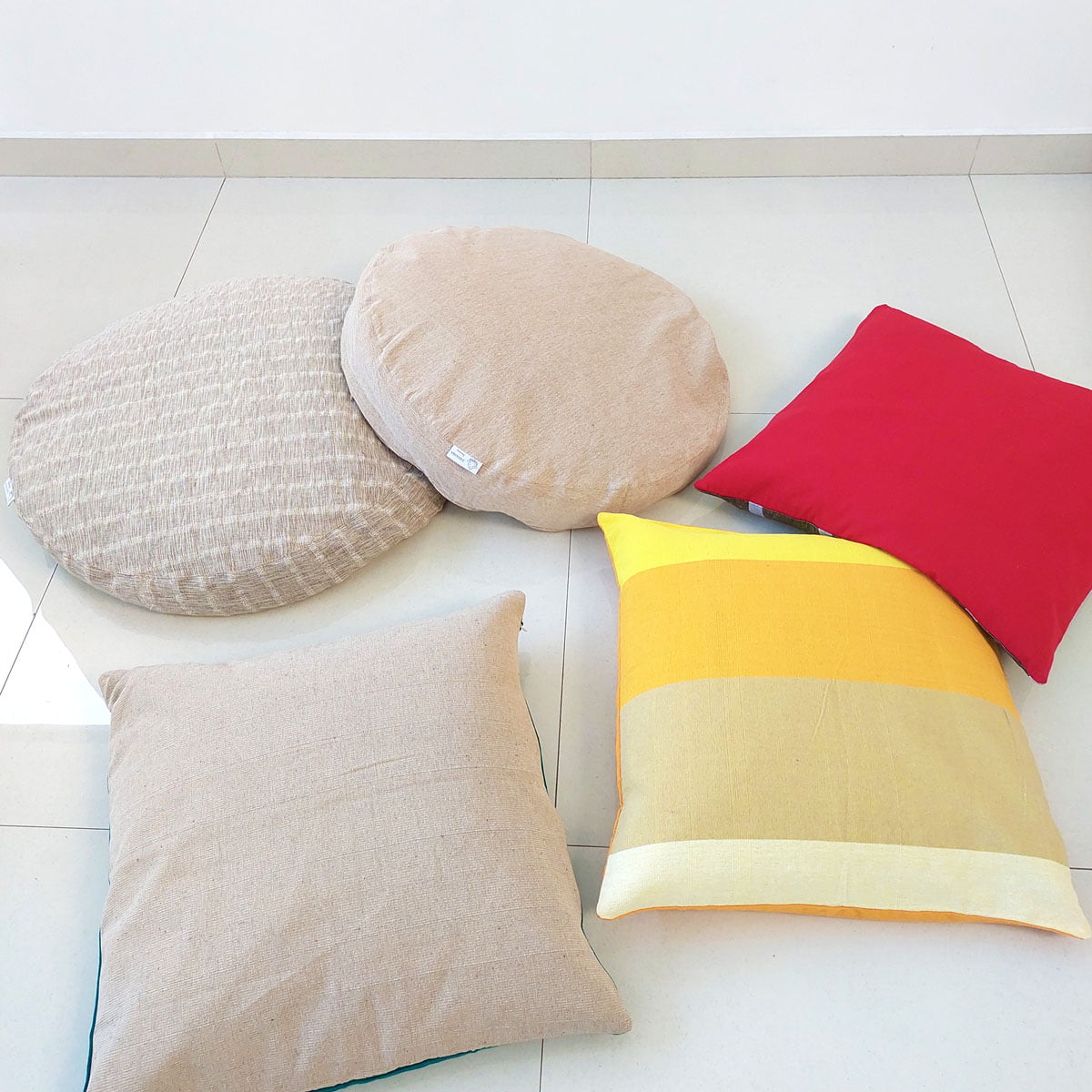 RAYS yellow orange floor cushion in handloom cotton 24"