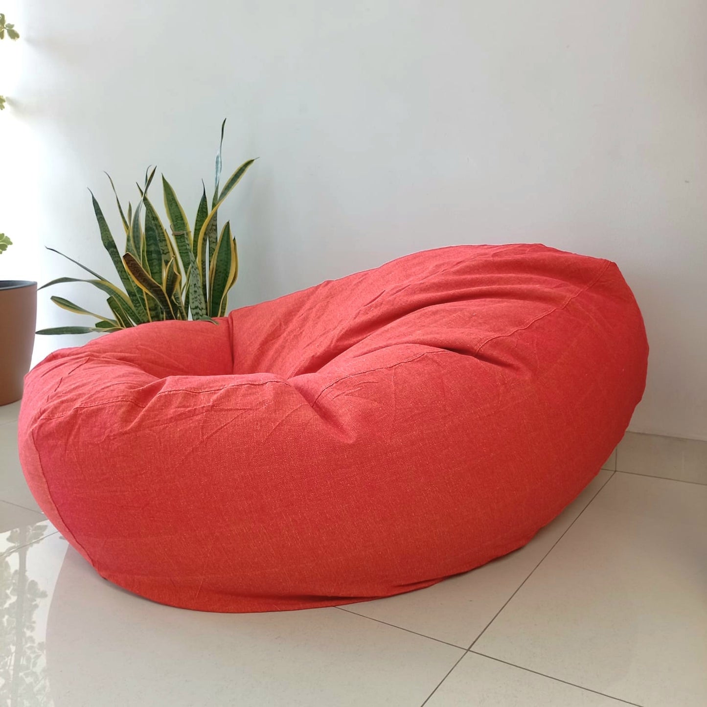 SURYA orange round compact bean bag chair in handloom cotton